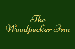The Woodpecker Inn logo